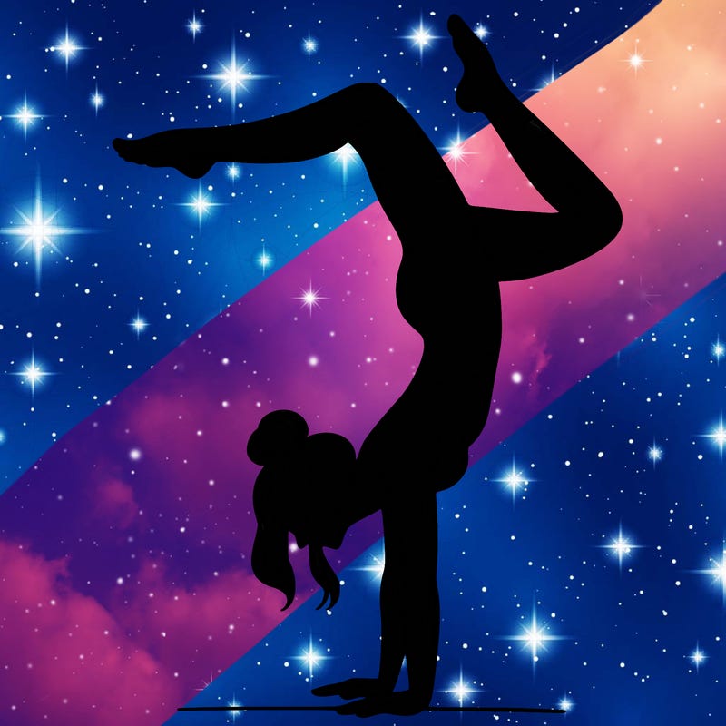 a woman doing a handstand