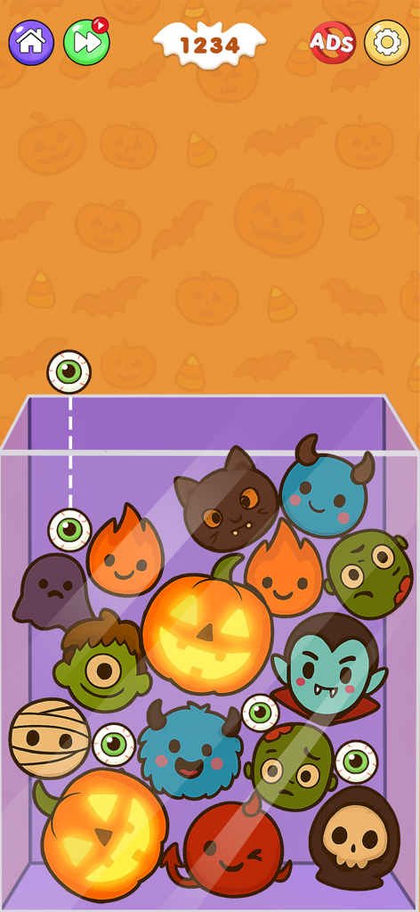 Halloween themed gameplay of Fruit Merge Watermelon Puzzle featuring cute monster characters and pumpkins