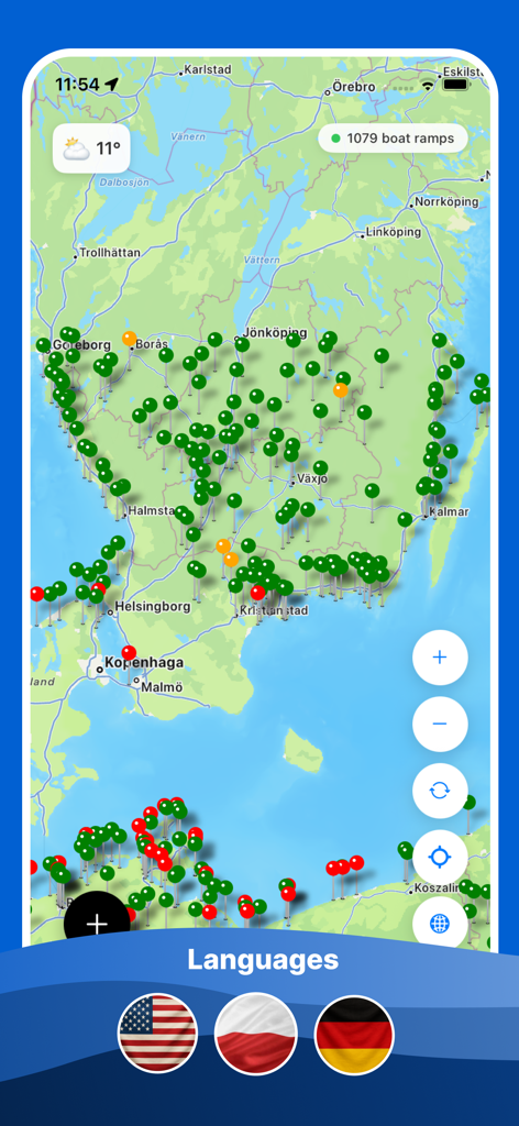 Uma interface de mapa móvel mostrando inúmeros locais de rampa de lançamento de barcos com pinos codificados por cores e informações meteorológicas em tempo real.