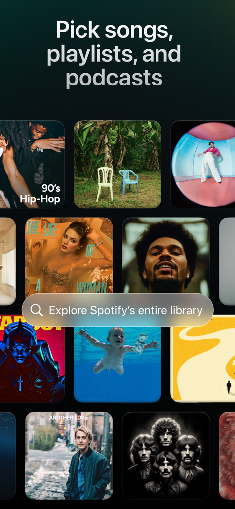 アラームクロック用の曲やプレイリストを選択するために、アルバムカバーのグリッドと検索バーが表示されたインターフェース