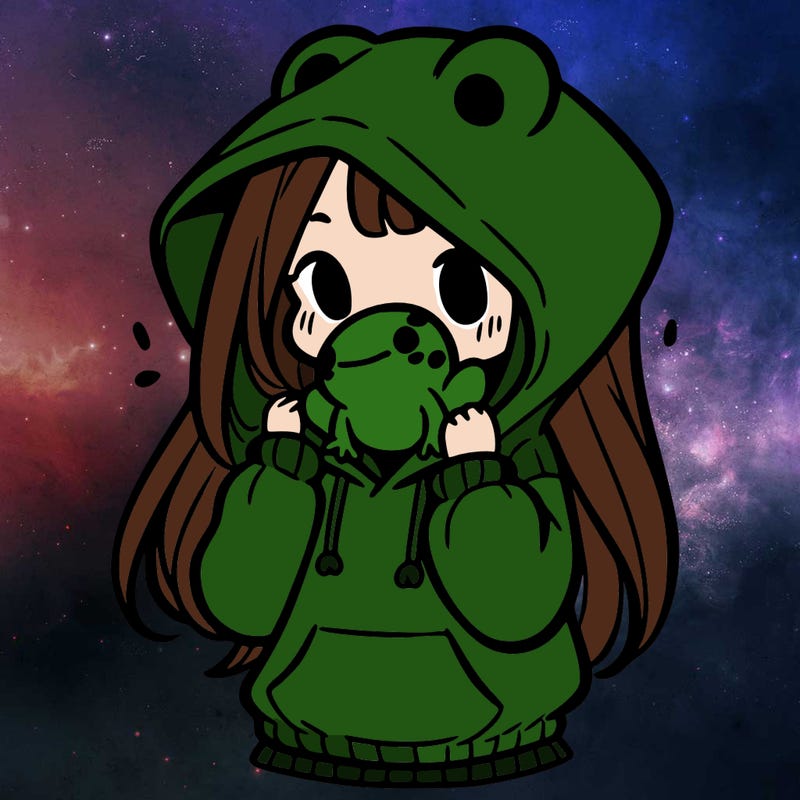 a girl holding a froggy hoodie