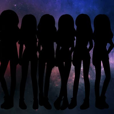 a group of girls wearing crop tops and shorts