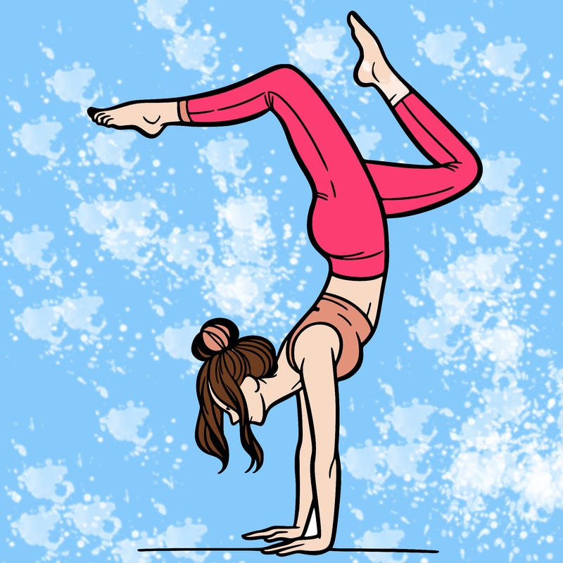a woman doing a handstand