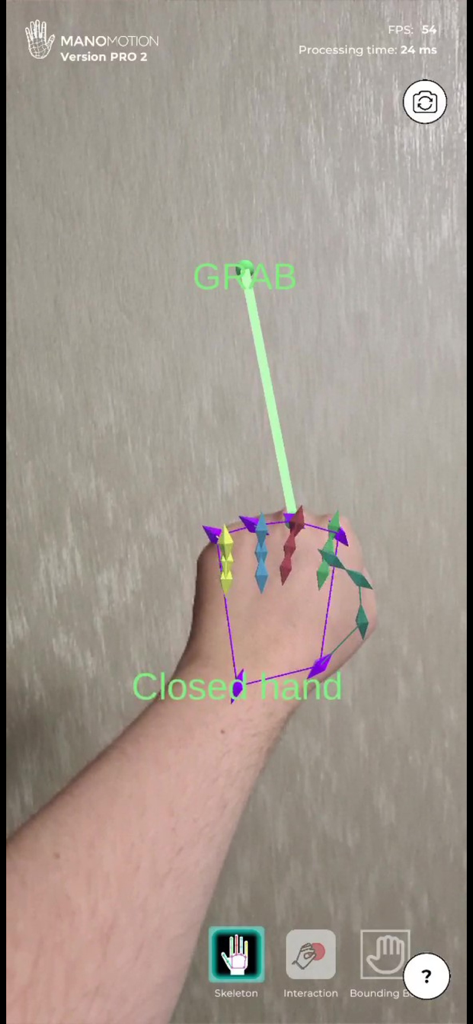 ManoMotion Tech Pro - Hand tracking app interface detecting a closed hand grab gesture with a skeletal overlay