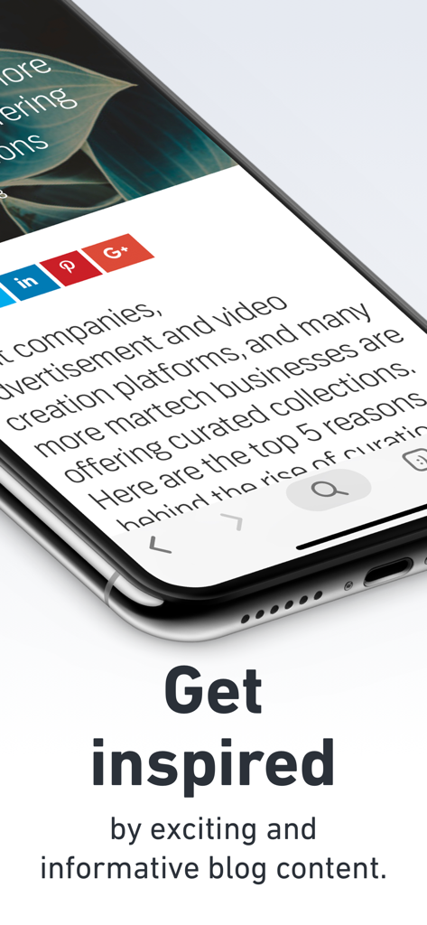 Close up of a smartphone screen showing the Shutterstock app blog section for creative inspiration.