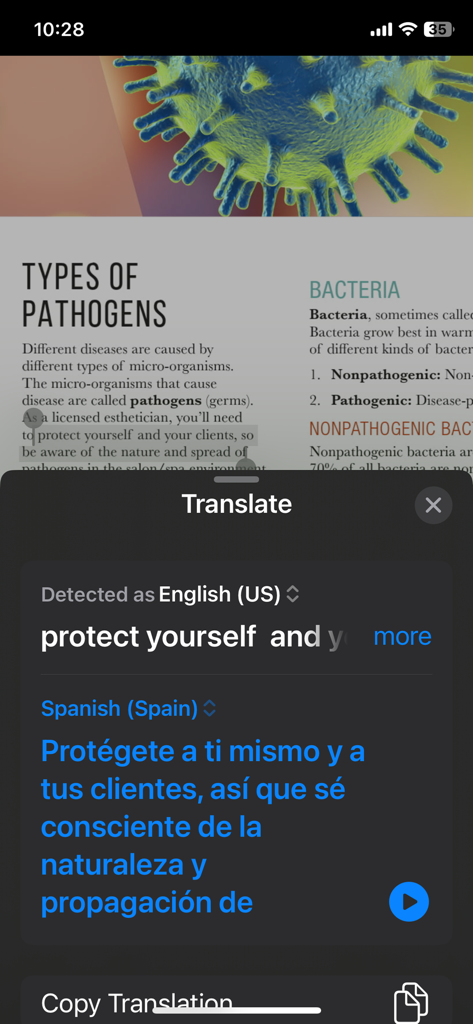 Pivot Point Reader - Interfaz de la aplicación Pivot Point Reader mostrando la traducción de texto educativo sobre patógenos del inglés al español.