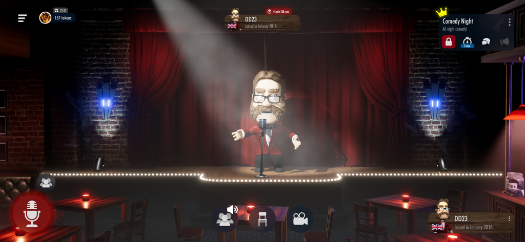 Comedy Night - The Voice Game - A 3D male avatar with glasses performing on a spotlighted stage with red curtains in Comedy Night