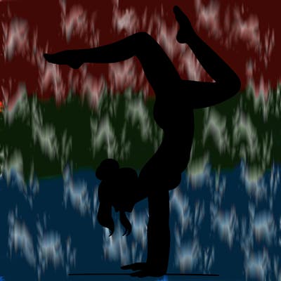 a woman doing a handstand