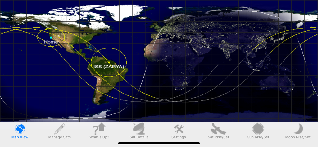 Satellite Tracker - Interface of the Satellite Tracker app showing a 2D world map with orbital paths and the current position of the International Space Station