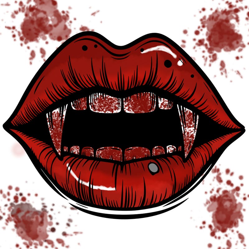 lips with vampire teeth