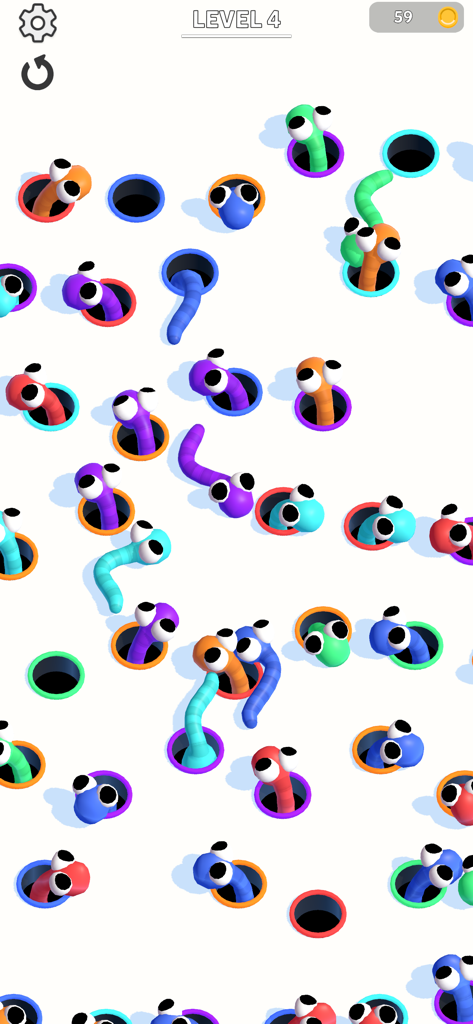 Hole Worm - Colorful worms popping out of matching colored holes in the Hole Worm puzzle game