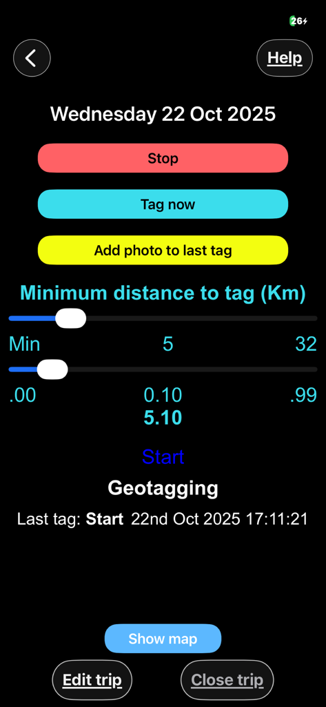 Active journey tracking screen in Track My Trip app with geotagging and photo options