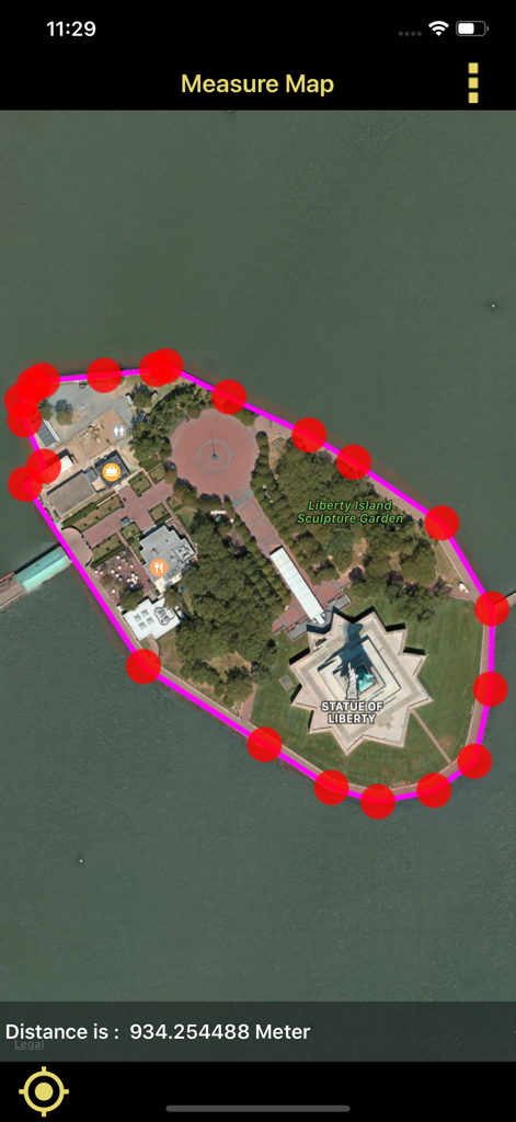 Distance & Area Measure On Map - A mobile app interface showing a red pin perimeter and distance measurement of Liberty Island on a satellite map