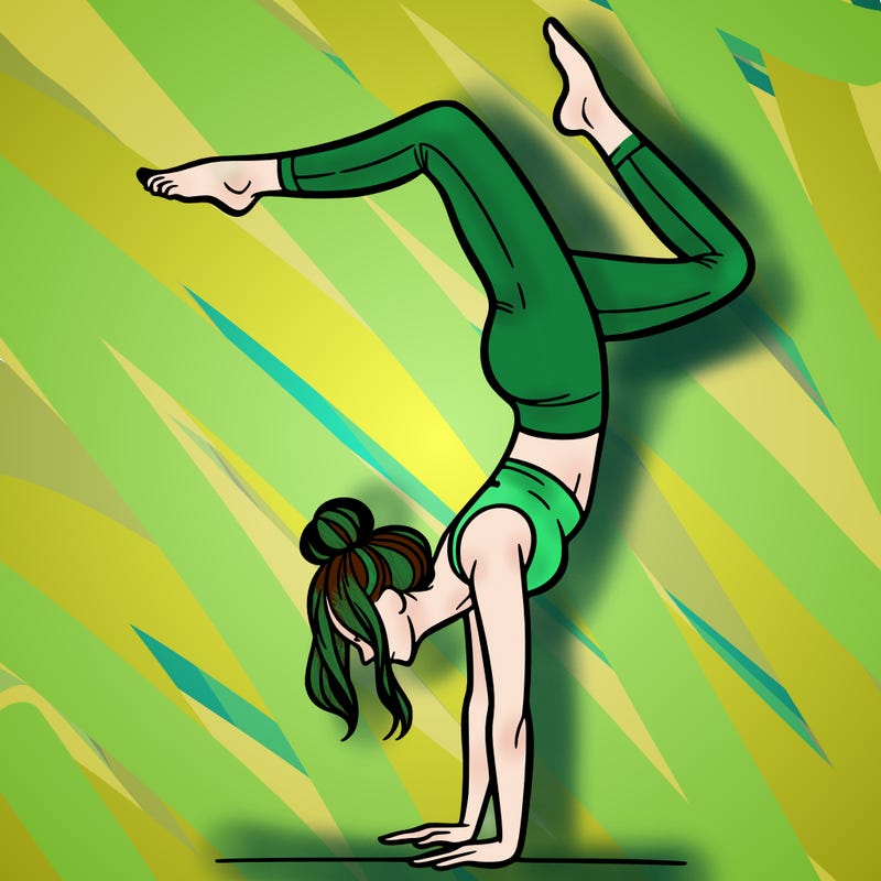 a woman doing a handstand