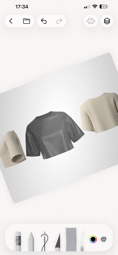 Digital fashion design workspace with realistic t-shirt templates and sketching tools