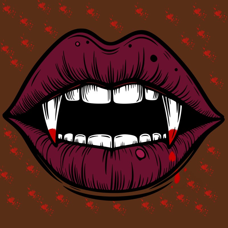 lips with vampire teeth
