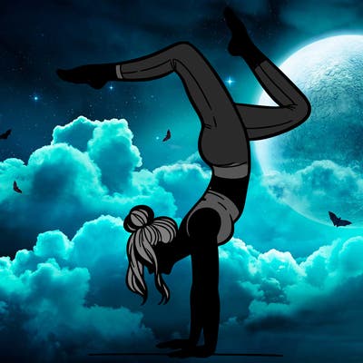 a woman doing a handstand