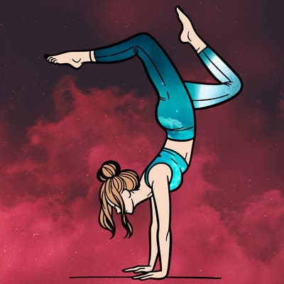 a woman doing a handstand