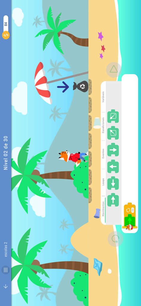 STEM Play - Letramento Digital - Interface de codificação infantil mostrando comandos de programação em blocos para mover um personagem de raposa em uma praia.