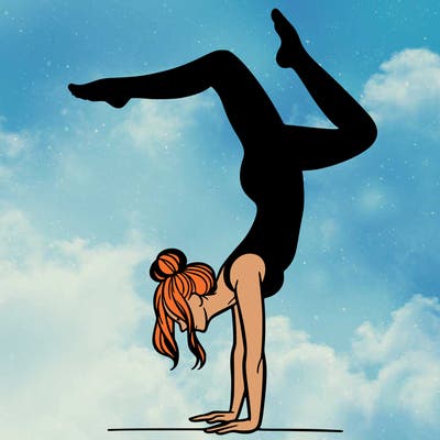 a woman doing a handstand