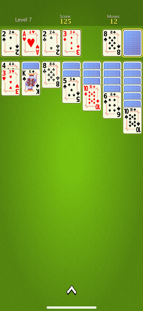 Solitaire Mobile - A game of Klondike solitaire in progress featuring large easy to read cards on a classic green background