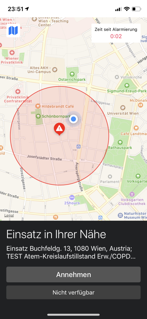 Teamösterreich LEBENSRETTER - Screenshot of the Teamösterreich LEBENSRETTER app showing a map with an emergency alert location and buttons to accept or decline the call for help.