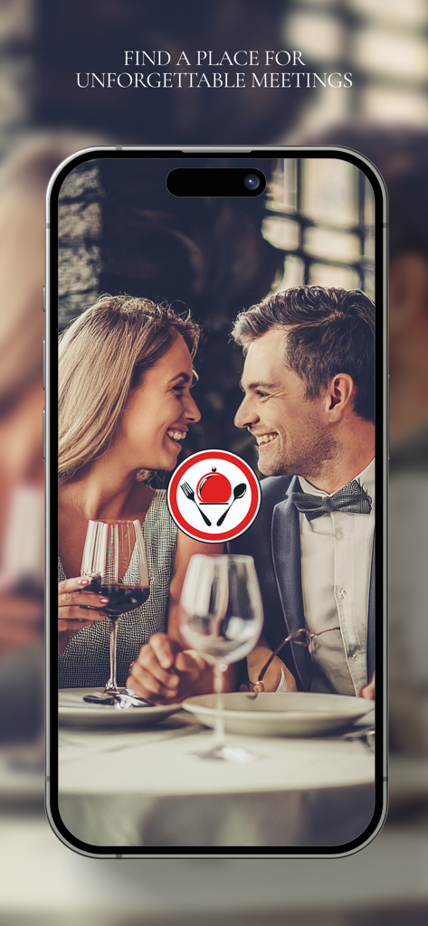 F date&eat - A smiling couple enjoying a dinner date at a restaurant with wine glasses
