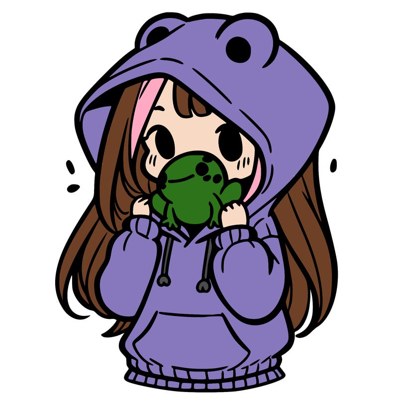 a girl holding a froggy hoodie