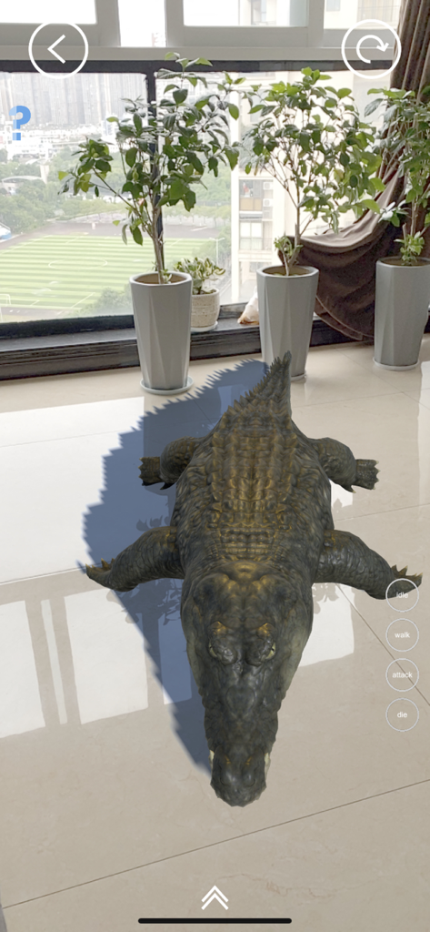 Real AR Zoo - Real AR Zoo 앱을 사용하여 거실에서 렌더링된 사실적인 3D 악어.