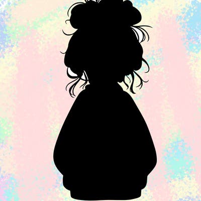 girl with baggy sweatshirt and messy bun