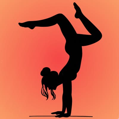 a woman doing a handstand