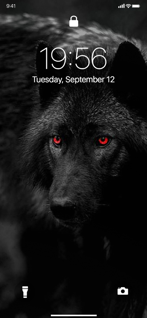 Lone Wolf Wallpapers - Black lone wolf wallpaper with glowing red eyes on a mobile phone lock screen