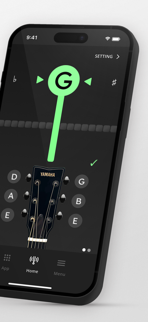 Yamaha guitar tuner app interface showing a green G note indicator for perfect tuning