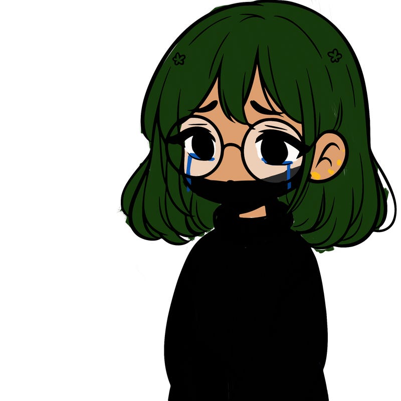 sad girl with glasses in a sweater
