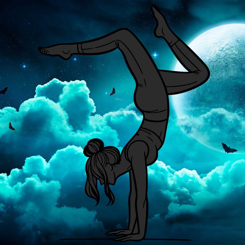 a woman doing a handstand