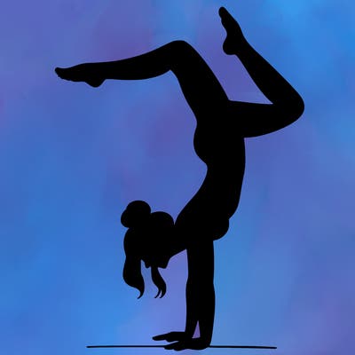 a woman doing a handstand