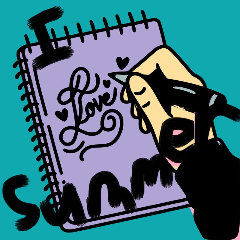 a hand writing “love” in calligraphy on a notebook