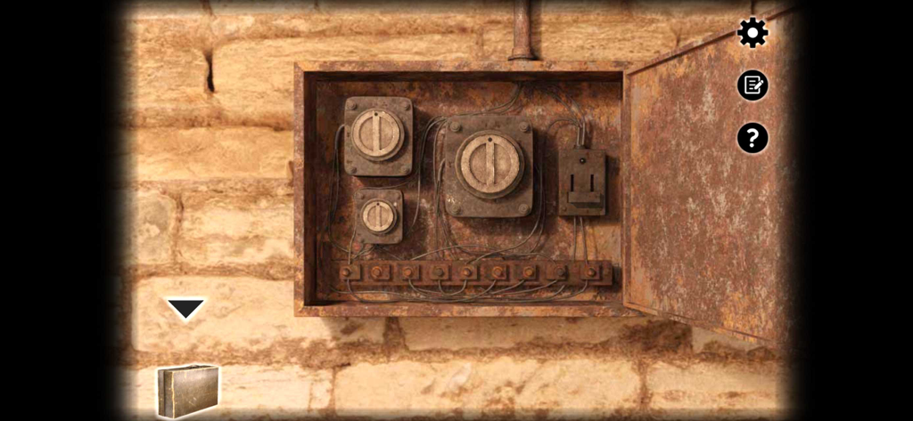 Haven - Escape Room Game - A rusty electrical fuse box puzzle on a stone wall in the Haven escape room game.