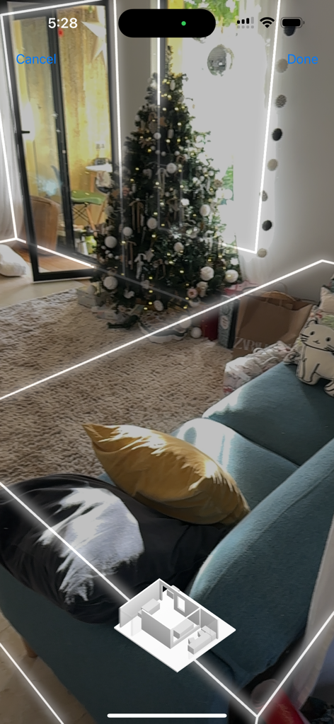 AI Room Plan Scanner app showing a live augmented reality scan of a living room with 3D floor plan visualization