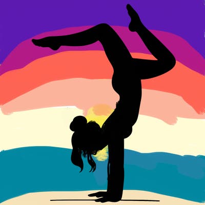 a woman doing a handstand