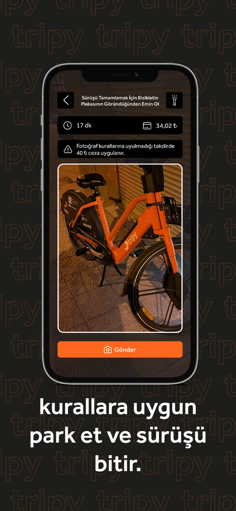 Pantalla de la aplicación móvil Tripy que muestra una bicicleta eléctrica naranja estacionada para finalizar un viaje