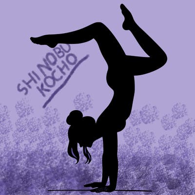 a woman doing a handstand