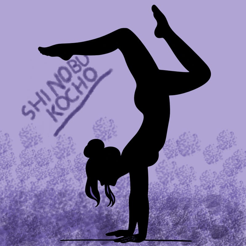 a woman doing a handstand