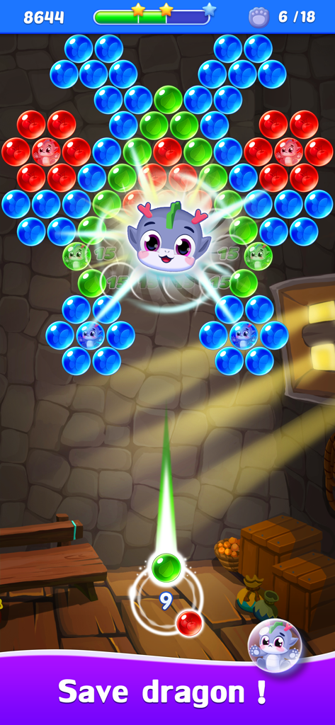 A colorful bubble shooter puzzle level where the player aims to save a trapped dragon pup