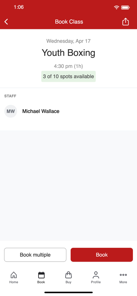 Work Train Fight - Interface of the Work Train Fight app showing the booking screen for a Youth Boxing class with available spots and instructor details.