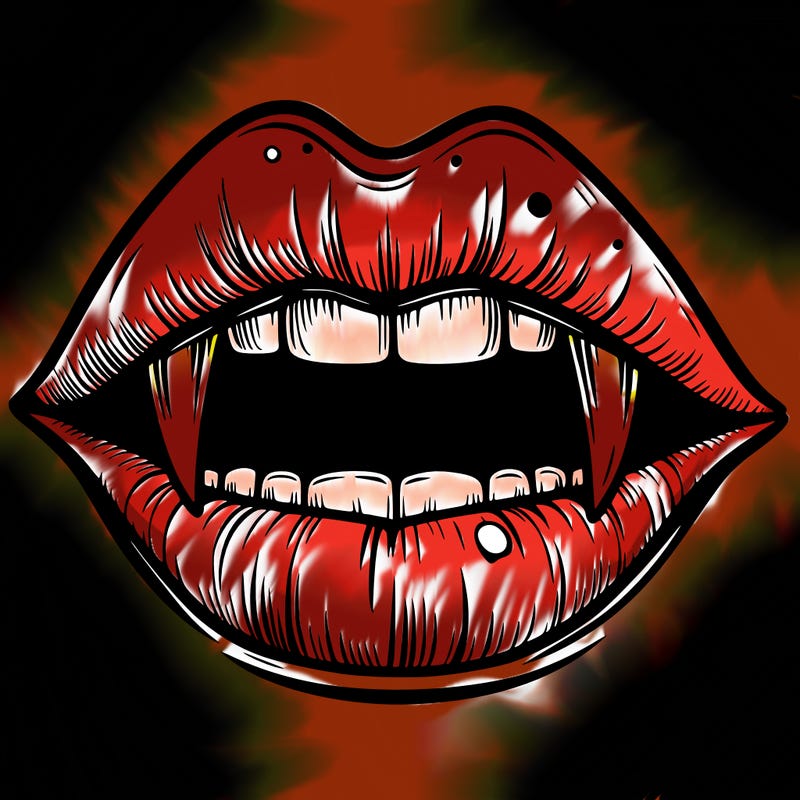 lips with vampire teeth