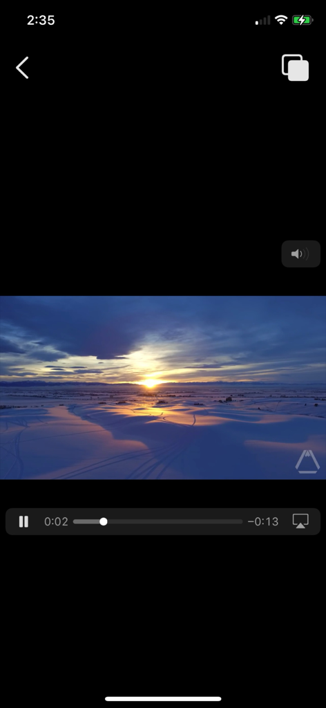 Media Player Plus - A video playback screen in the Media Player Plus app showing a sunset over a snowy landscape with playback controls.