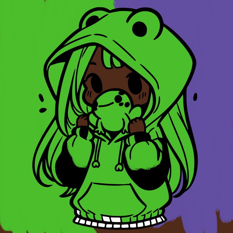 a girl holding a froggy hoodie