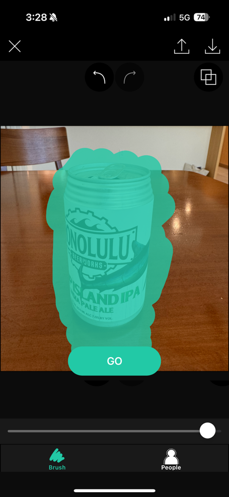 Background Eraser app interface with a brush tool selecting a can for cutout