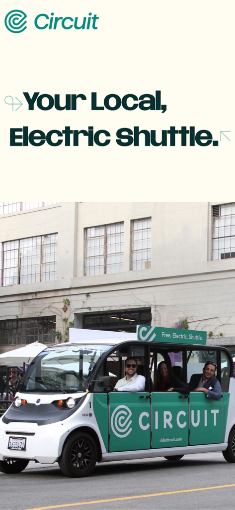 A branded Ride Circuit electric shuttle vehicle carrying passengers on a city street